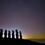 Rizing image showcasing the magnificent silhouette of the Moai statues against a moonlit sky, capturing the essence of the Rapa Nui calendar's deep connection to lunar cycles